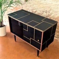 meuble-dappoint-noir-dor-lignes